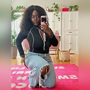 Black Zip-Up Bodysuit with White Accents